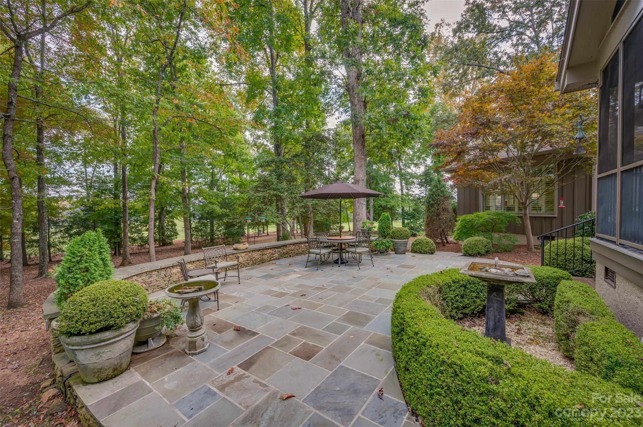 1389 Landrum Road Columbus, NC 28722 - Photo 7 of 46 a view of a backyard with sitting area