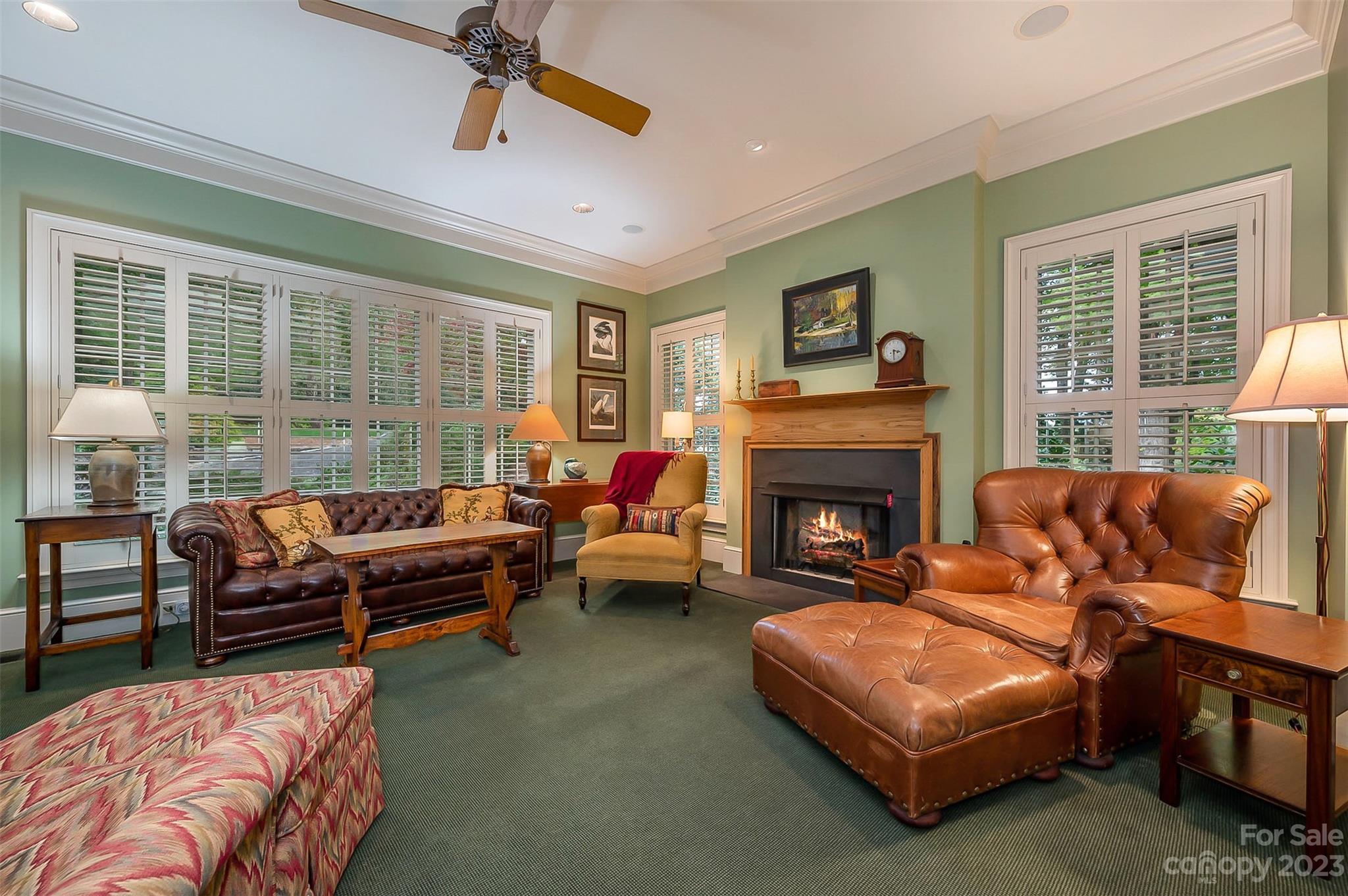 1389 Landrum Road Columbus, NC 28722 - Photo 10 of 46 a living room with furniture and a fireplace