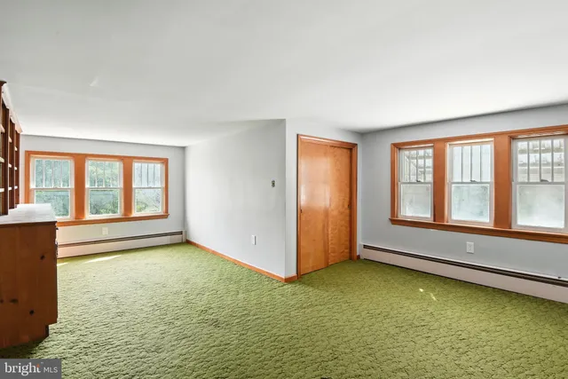 a view of an empty room with window