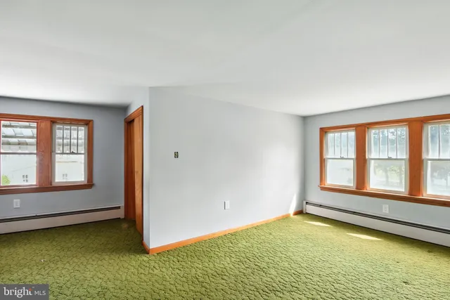 a view of an empty room with window