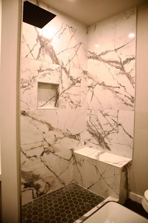 428 Van Molan Street Houston, TX 77022 - Photo 14 of 20 a bathroom with a sink toilet and shower