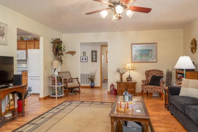 a kitchen with cabinets appliances and a sink