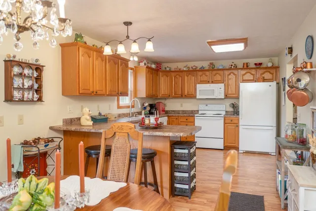 a living room with furniture and flat screen tv