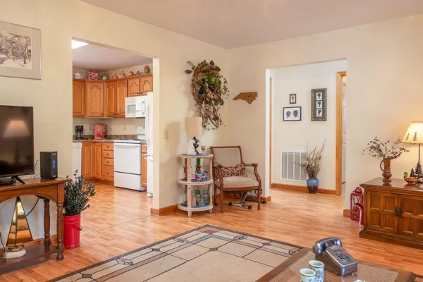 a view of a house with a yard and garage