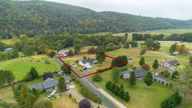 a view of a lake with a yard