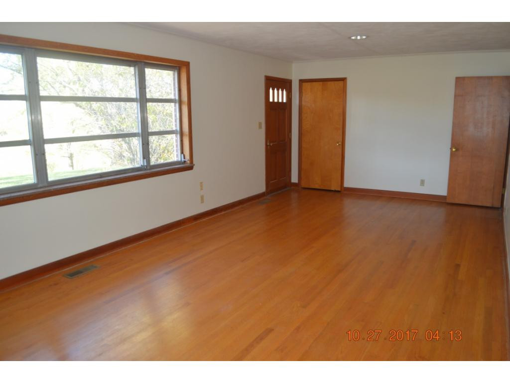 12115 Warrensburg Road Midway, TN 37809 - Photo 10 of 19 Large living room whardwood