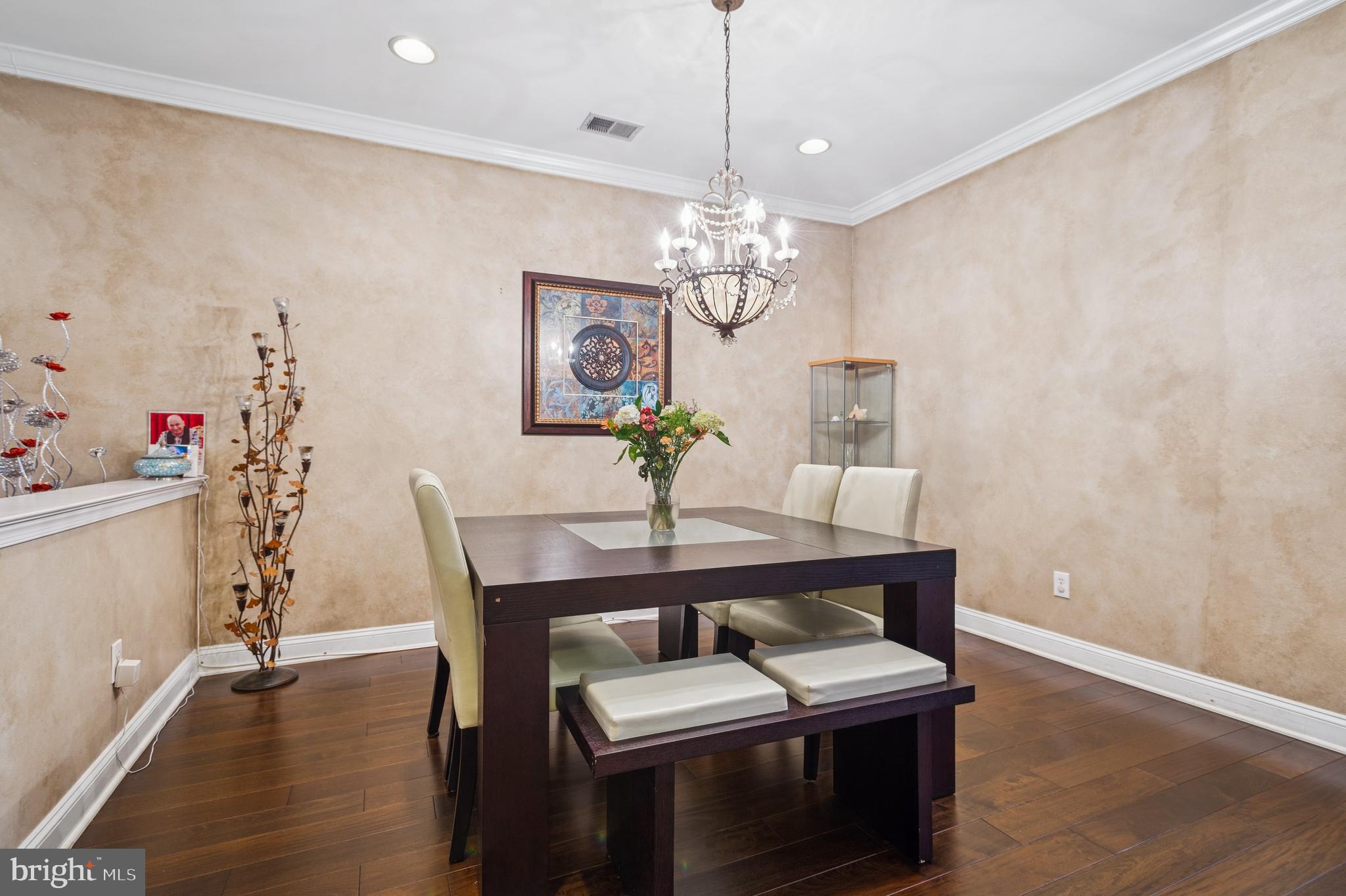 19 York Road Princeton Junction, NJ 08550 - Photo 11 of 19 a view of a dining room with furniture wooden floor and a chandelier