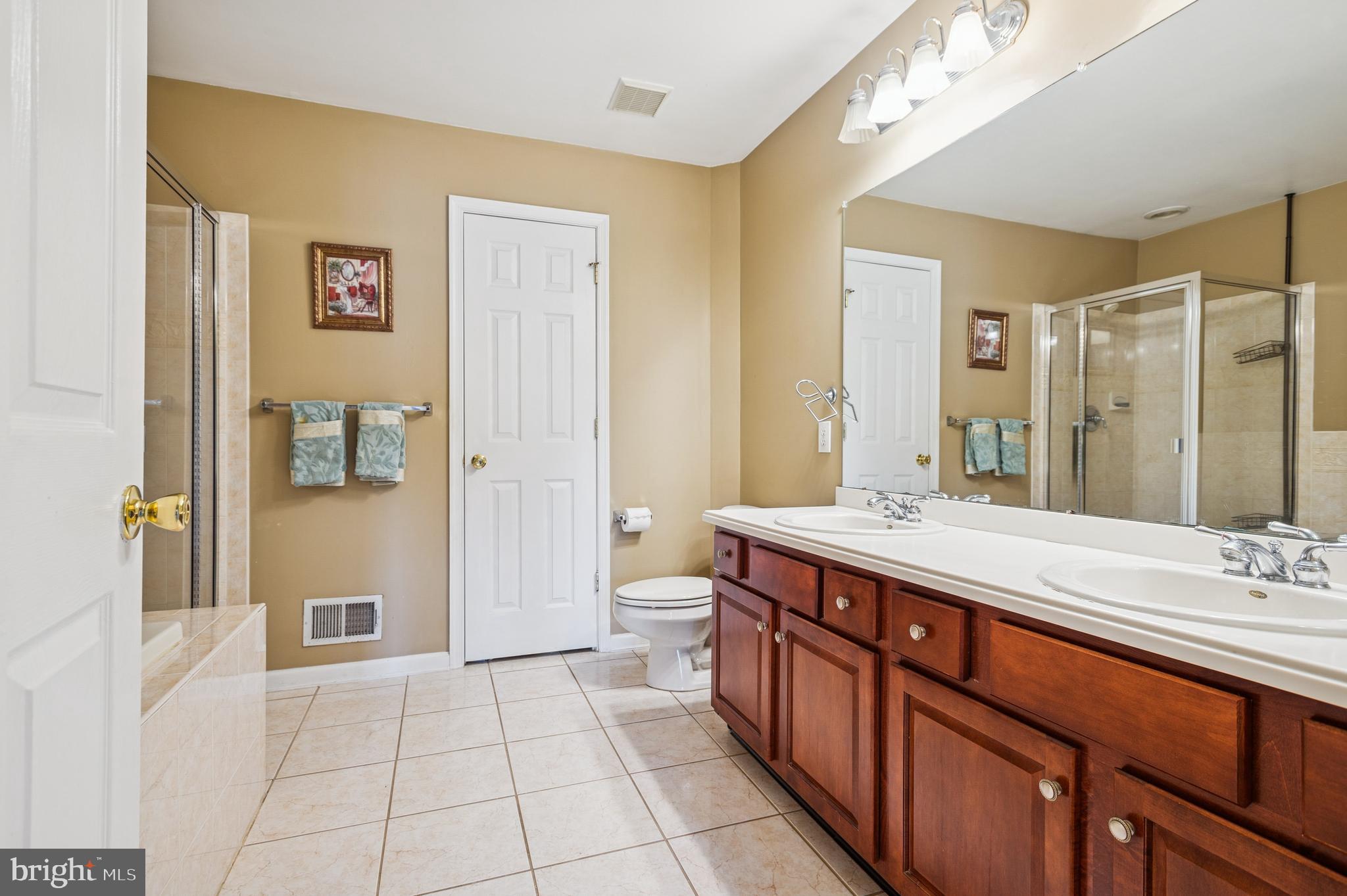 19 York Road Princeton Junction, NJ 08550 - Photo 17 of 19 a spacious bathroom with a double vanity sink mirror and