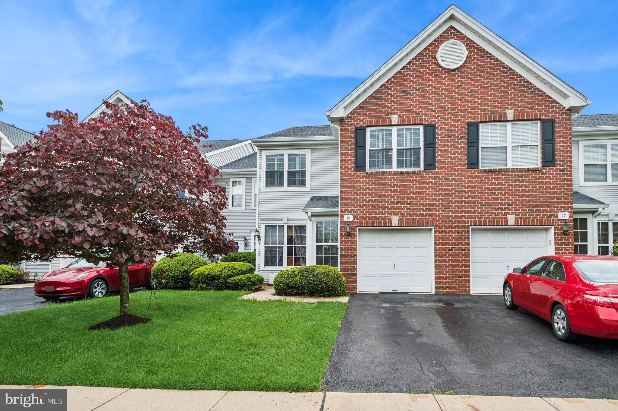 19 York Road Princeton Junction, NJ 08550 - Photo 2 of 19 a front view of a house with a yard