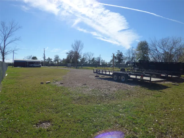 a view of a garden with houses