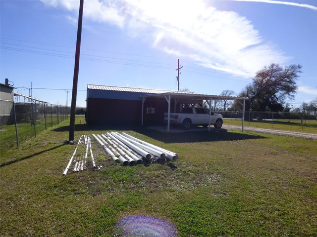 a view of a yard with a slide