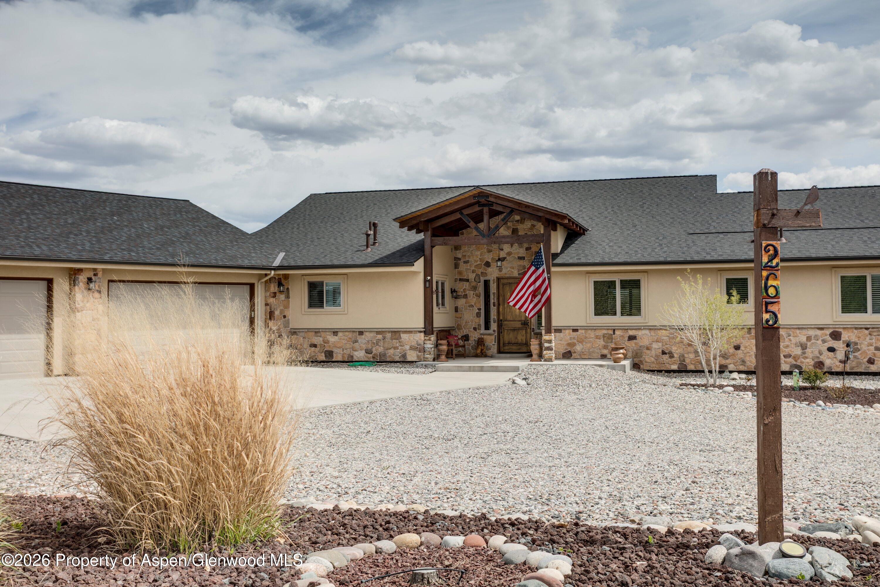 265 South Meadow Drive Rifle, CO 81650 - Photo 2 of 76 17-265 S Meadow Drive - Driveway and Ent