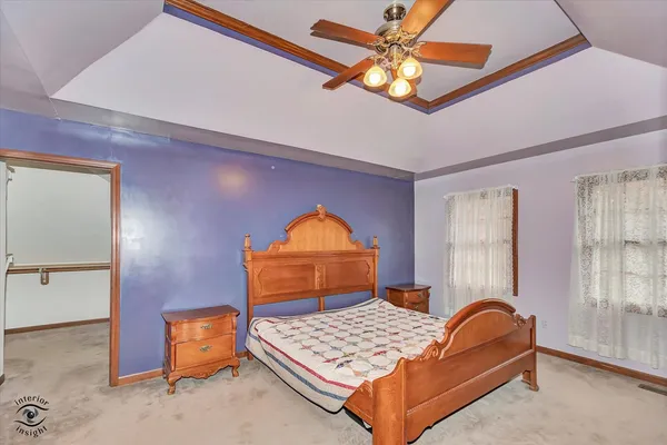 a living room with furniture a couch and dresser