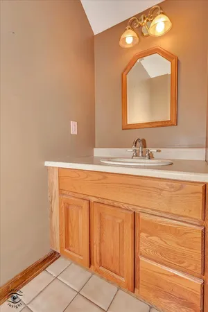 a view of a room with a wooden door