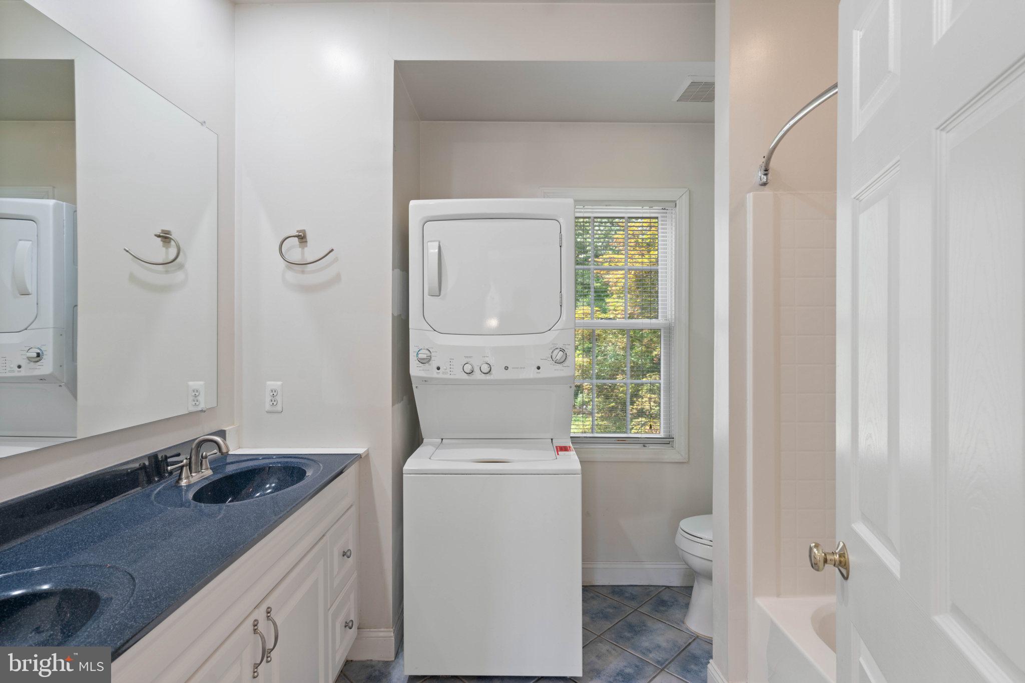 4512 Gage Road Alexandria, VA 22309 - Photo 22 of 69 Hallway Bath with double vanity and washer dryer
