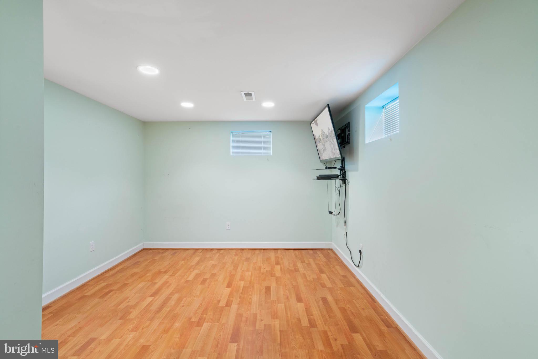 4512 Gage Road Alexandria, VA 22309 - Photo 46 of 69 Open Area in Basement includes use of 50in TV