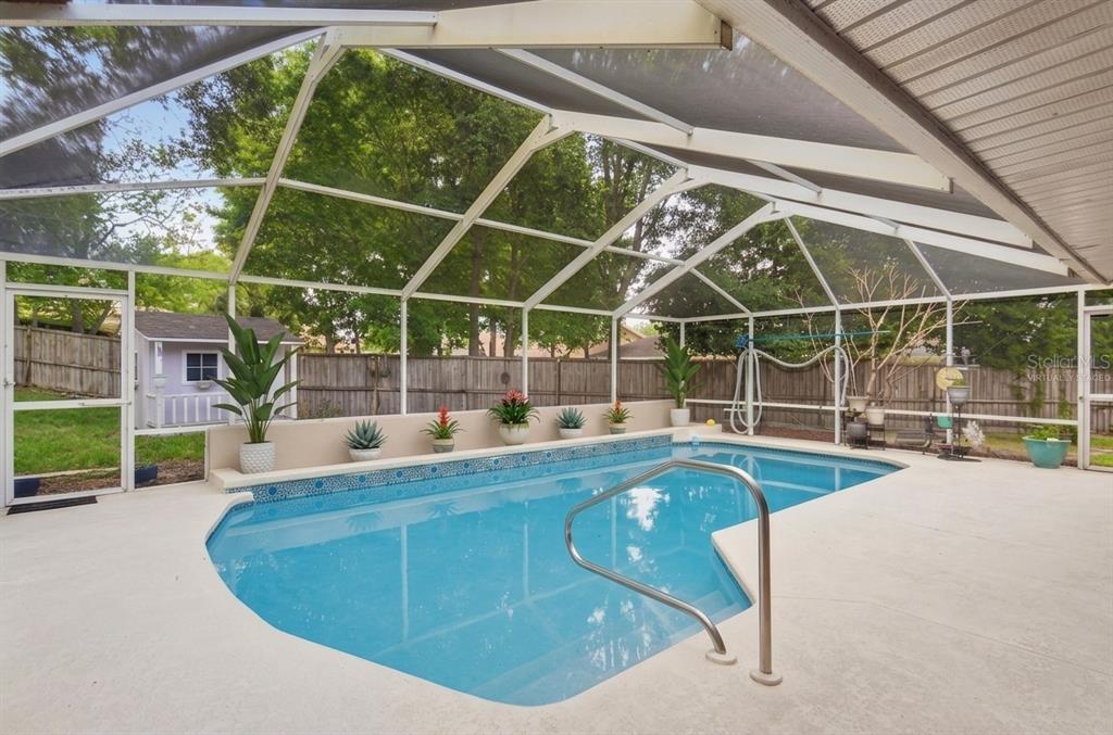 215 Santa Rosa Drive Winter Haven, FL 33884 - Photo 26 of 29 a view of a swimming pool with a yard