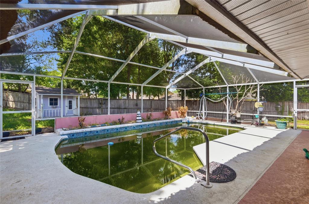 215 Santa Rosa Drive Winter Haven, FL 33884 - Photo 27 of 29 a view of a backyard with swimming pool