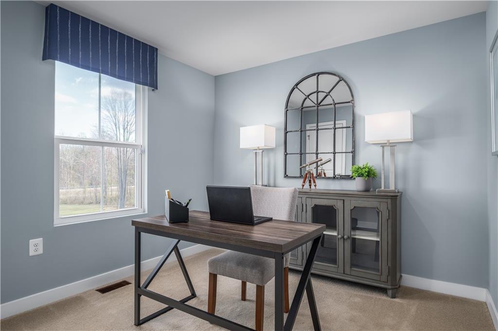 395 Horseshoe Loop Washington, PA 15301 - Photo 13 of 14 a view of a dining room with furniture window and wooden floor