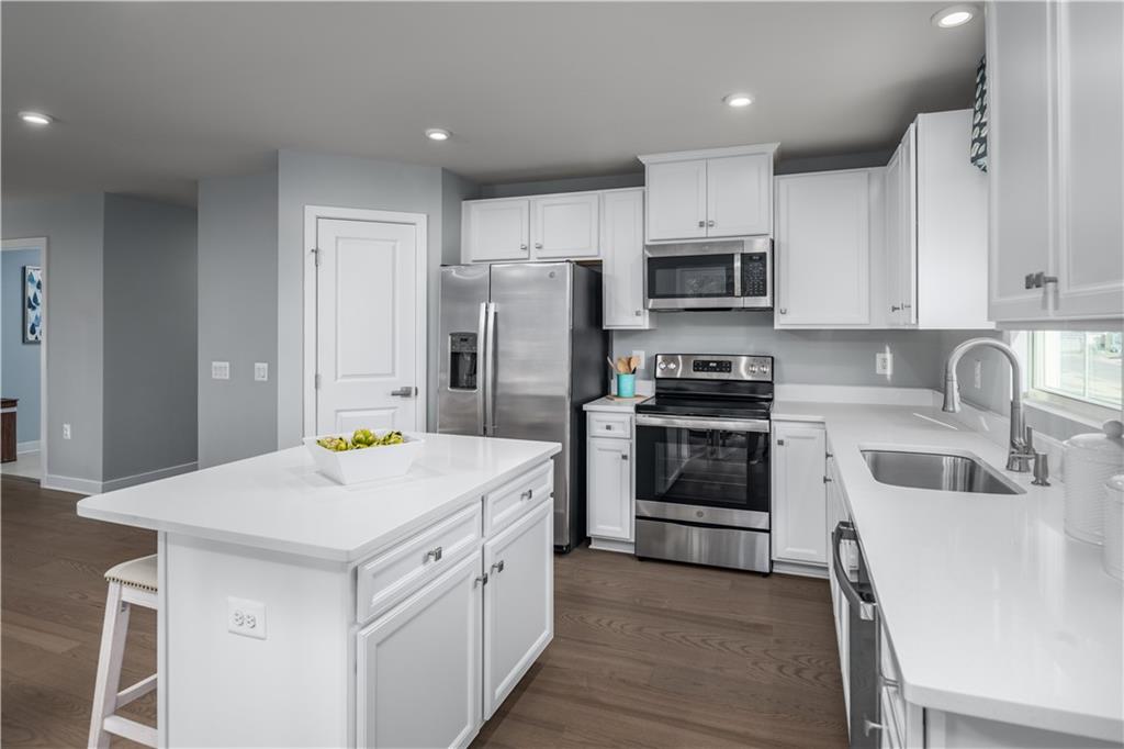 395 Horseshoe Loop Washington, PA 15301 - Photo 6 of 14 a kitchen that has a sink cabinets and stainless steel appliances