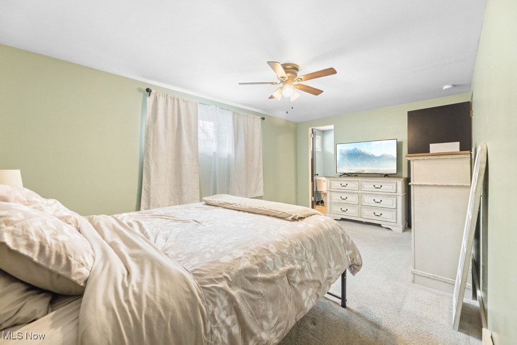 4551 17th Street Northwest Canton, OH 44708 - Photo 28 of 39 Bedroom featuring a ceiling fan and light colored carpet