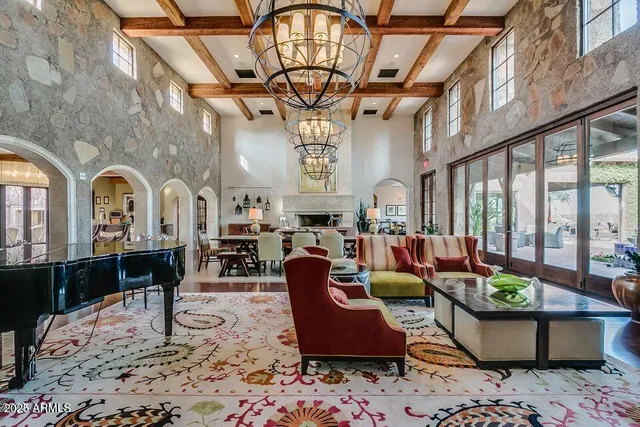 a view of a dinning tables and chairs in a patio