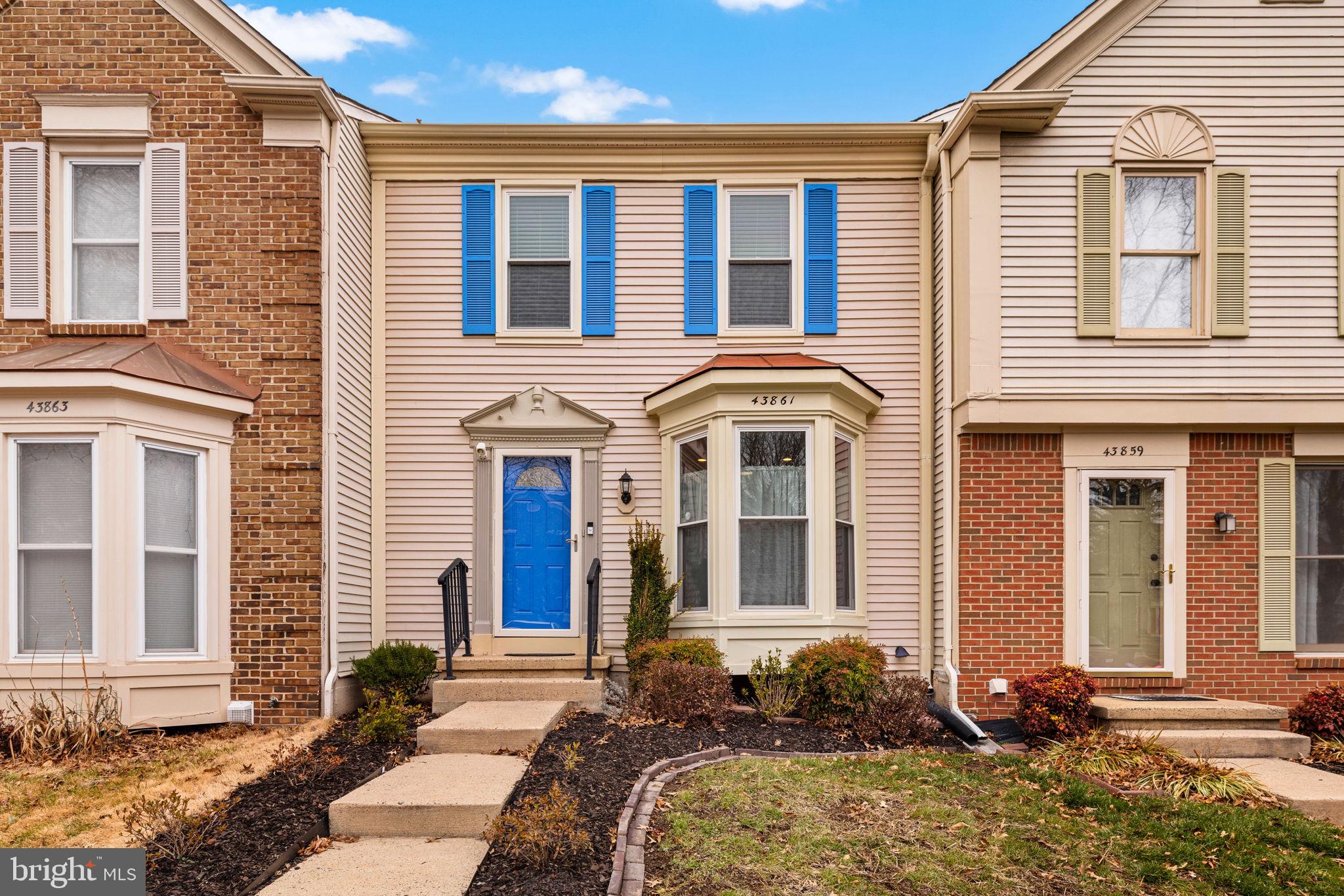 43861 Laburnum Square Ashburn, VA 20147 - Photo 1 of 46 a front view of a house