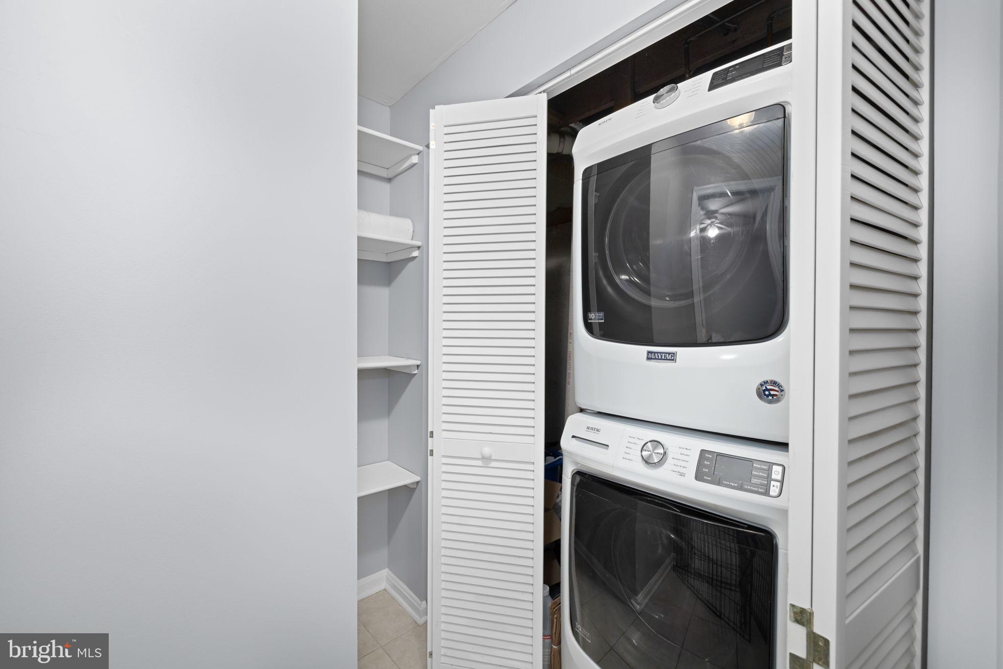 43861 Laburnum Square Ashburn, VA 20147 - Photo 33 of 46 a close up view of a washer and dryer