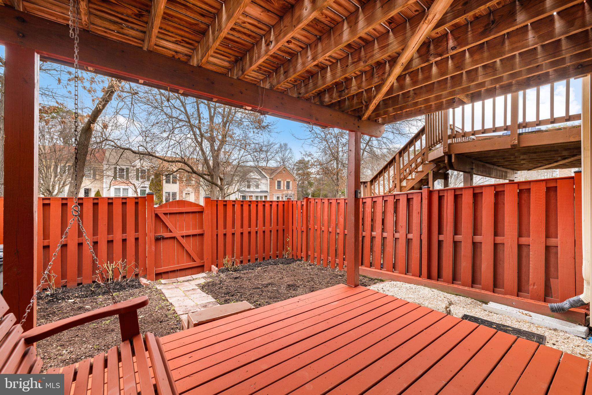 43861 Laburnum Square Ashburn, VA 20147 - Photo 46 of 46 a view of a backyard with wooden fence
