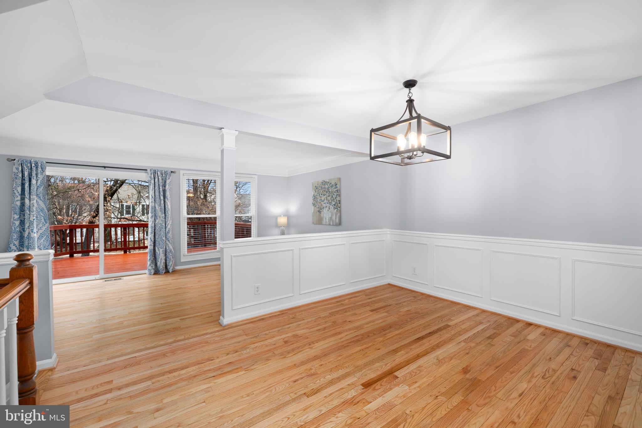 43861 Laburnum Square Ashburn, VA 20147 - Photo 6 of 46 a view of empty room with wooden floor and fan