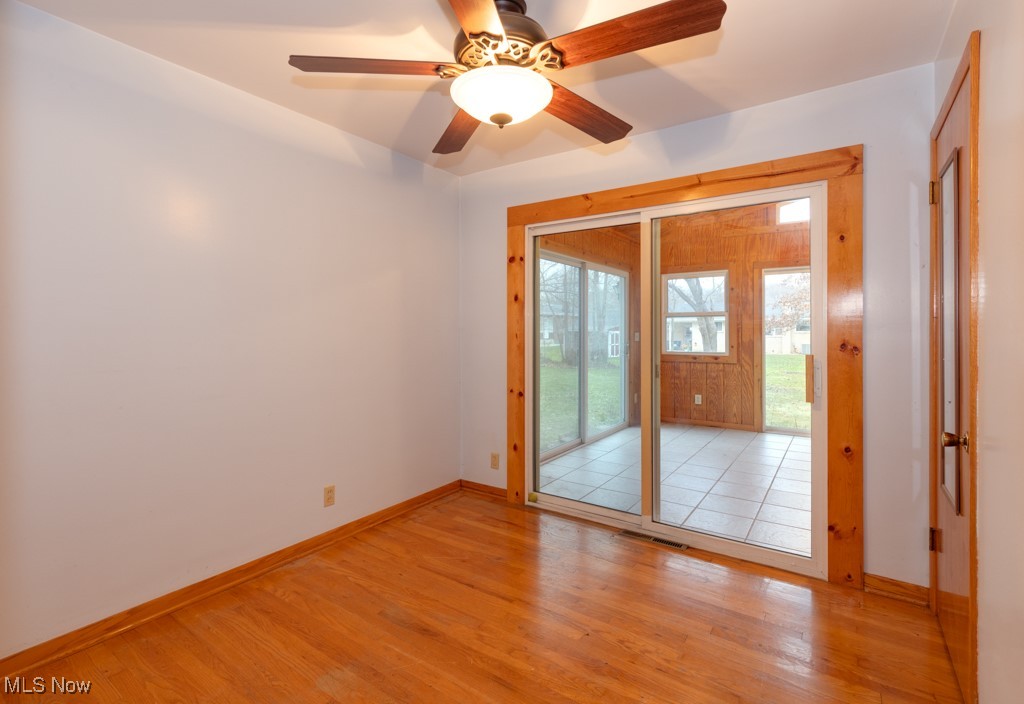 2837 Shellhart Road Barberton, OH 44203 - Photo 13 of 25 Bedroom #2, was most recently used as an office. The owners added a sunroom onto the back of the house from this bedroom. It would make a great first floor laundry room!