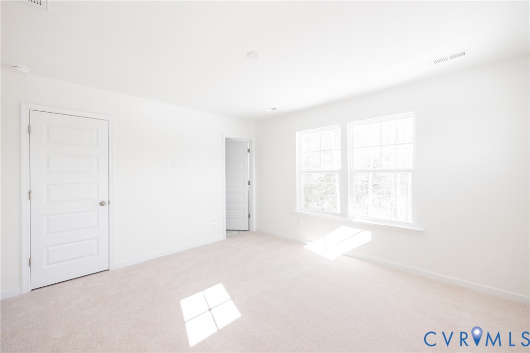 239 Greenpark Road Sandston, VA 23150 - Photo 13 of 31 an empty room with windows