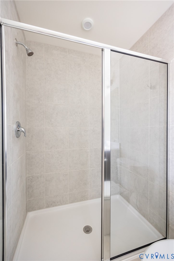 239 Greenpark Road Sandston, VA 23150 - Photo 16 of 31 a bathroom with a shower and a bath tub