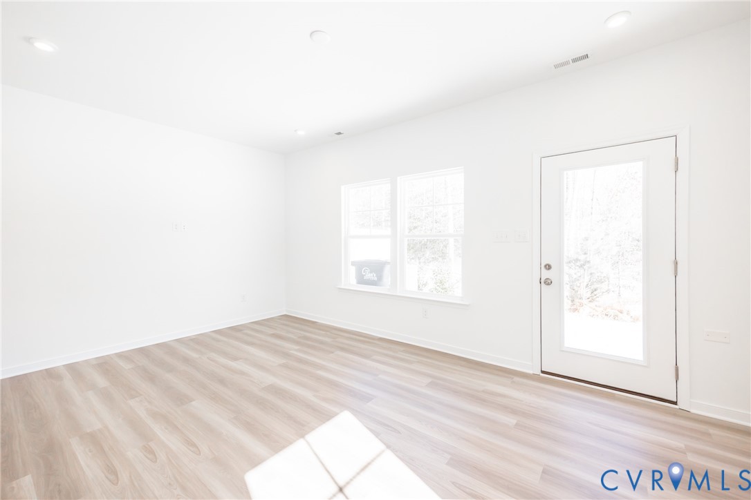 239 Greenpark Road Sandston, VA 23150 - Photo 8 of 31 an empty room with windows