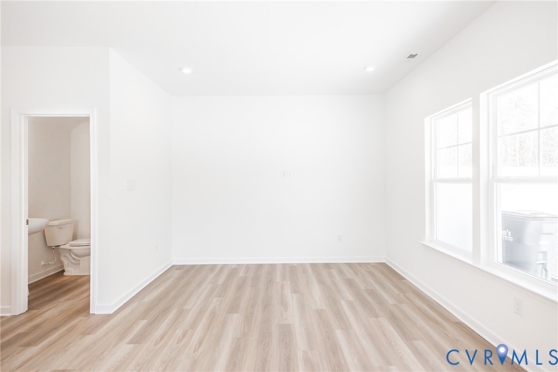239 Greenpark Road Sandston, VA 23150 - Photo 9 of 31 a view of empty room with wooden floor