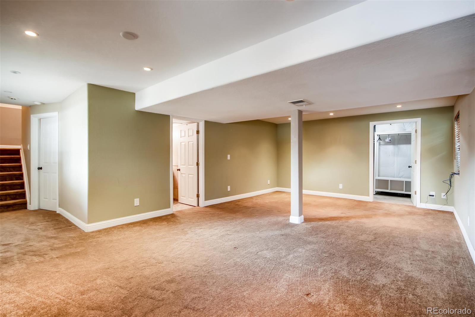 1518 Spring Water Way Highlands Ranch, CO 80129 - Photo 21 of 26 an empty room with window and an entrance