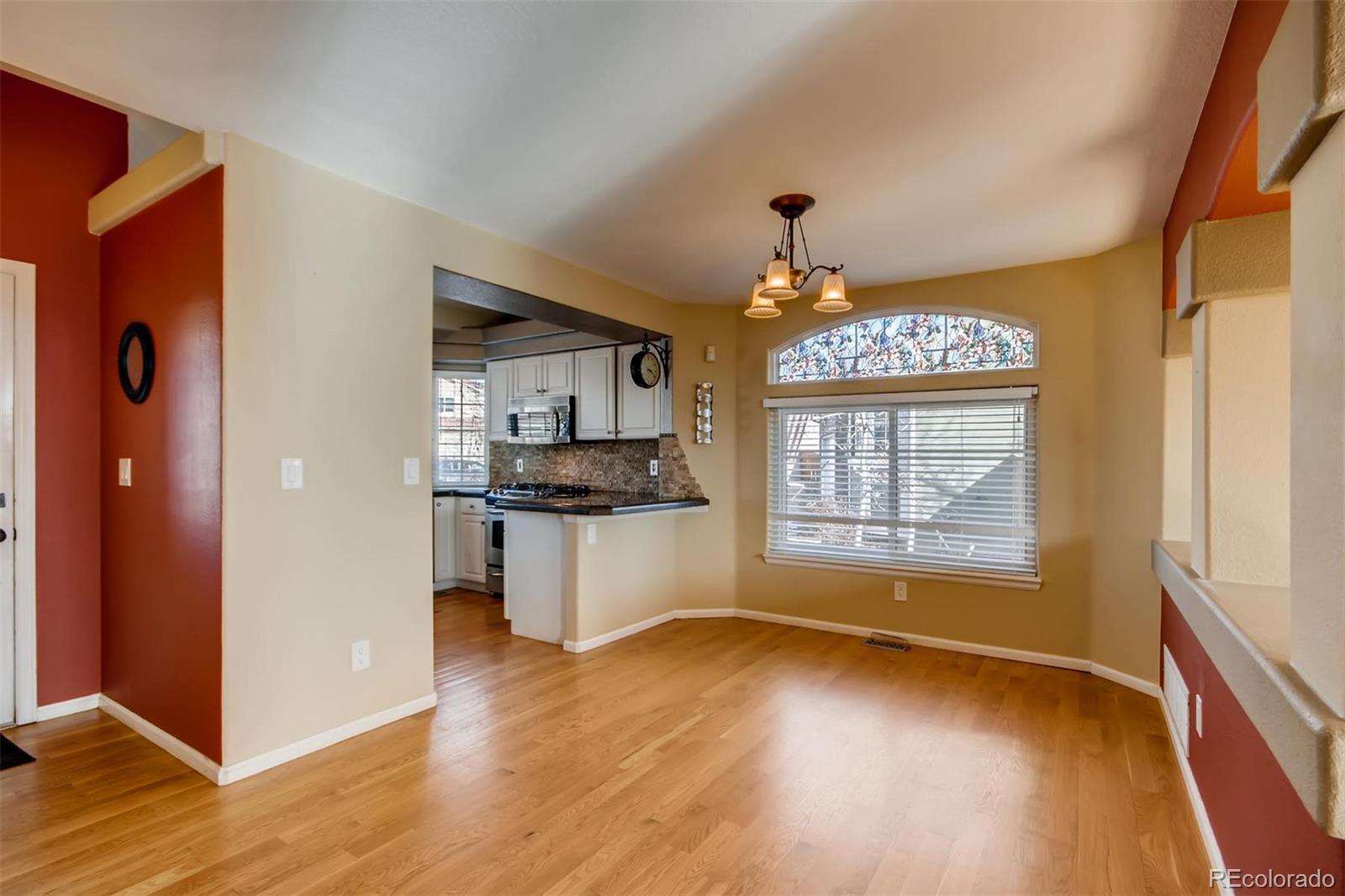 1518 Spring Water Way Highlands Ranch, CO 80129 - Photo 7 of 26 a view of kitchen and window