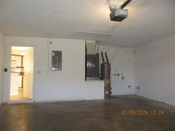 a view of empty room with windows