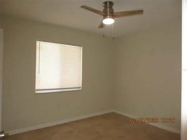 an empty room with a window