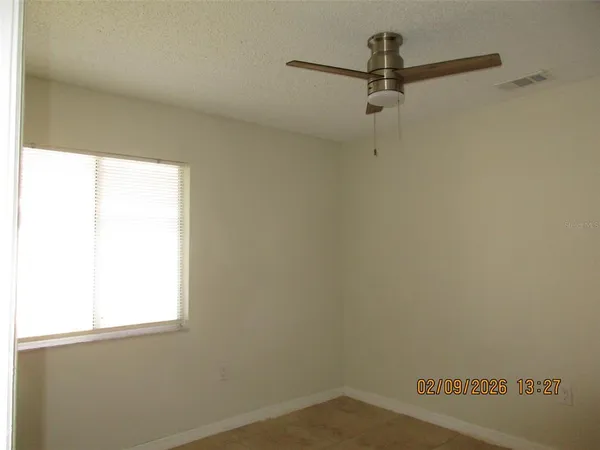 a view of a window in an empty room