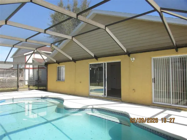 a swimming pool with yard