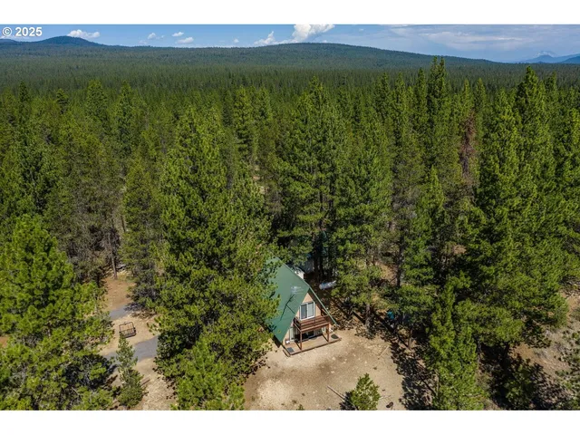 a view of a yard with an outdoor space