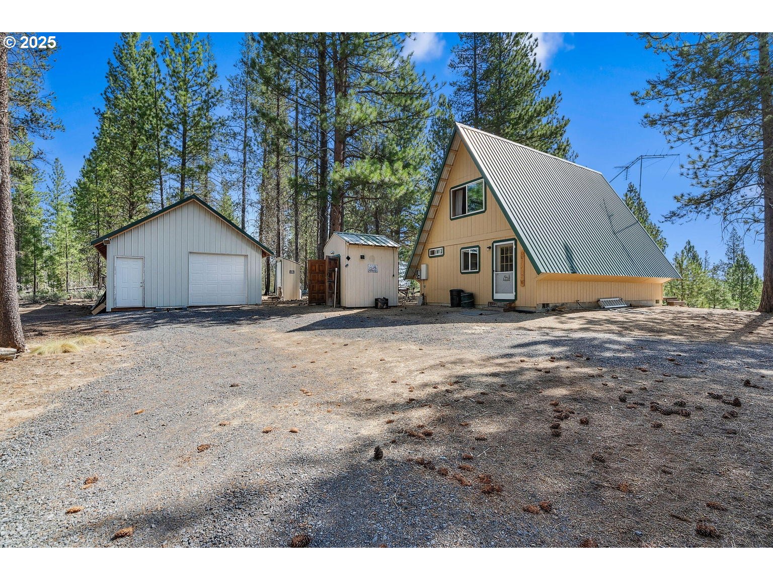 143970 Highway 97 Gilchrist, OR 97737 - Photo 3 of 30 a view of a house with a yard
