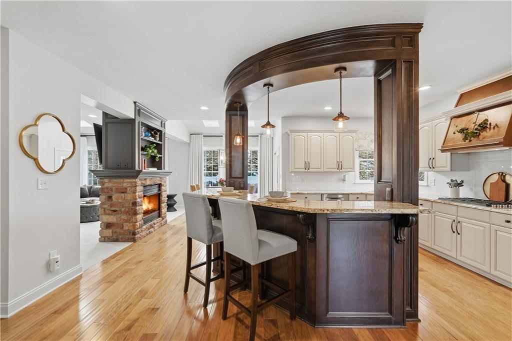 2017 Condor Lane Gibsonia, PA 15044 - Photo 12 of 49 a dining hall with stainless steel appliances granite countertop a stove and a wooden floors