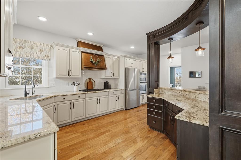2017 Condor Lane Gibsonia, PA 15044 - Photo 13 of 49 a kitchen with stainless steel appliances granite countertop a sink stove and refrigerator