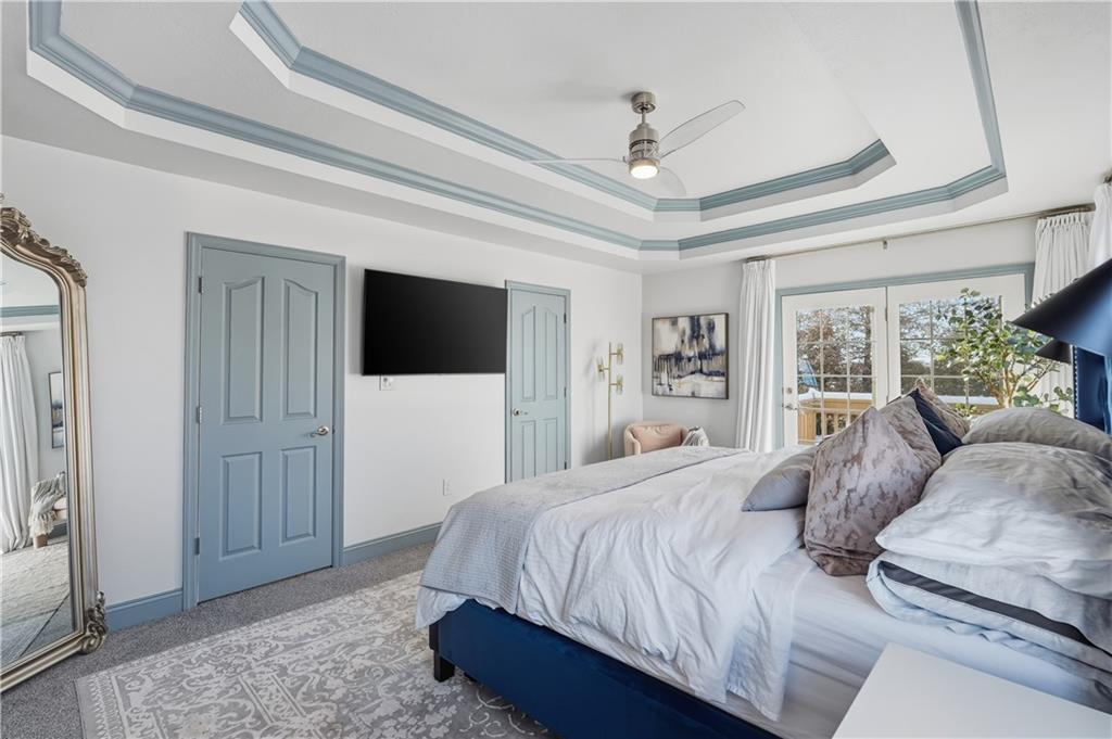 2017 Condor Lane Gibsonia, PA 15044 - Photo 25 of 49 a bedroom with a large bed a flat tv screen and a dresser