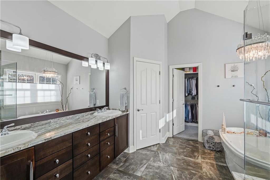 2017 Condor Lane Gibsonia, PA 15044 - Photo 28 of 49 a spacious bathroom with a granite countertop tub sink and mirror