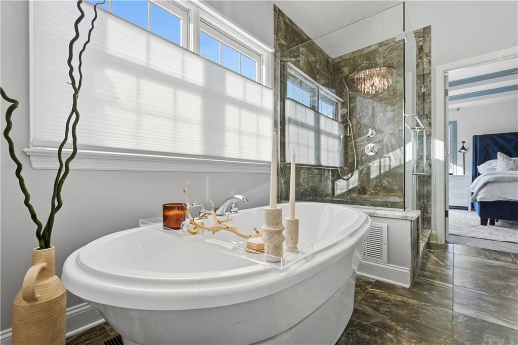 2017 Condor Lane Gibsonia, PA 15044 - Photo 30 of 49 a white bath tub sitting next to a bathroom