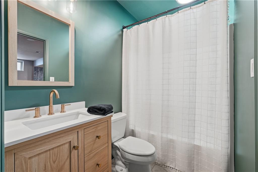 2017 Condor Lane Gibsonia, PA 15044 - Photo 38 of 49 a bathroom with a sink a toilet and vanity