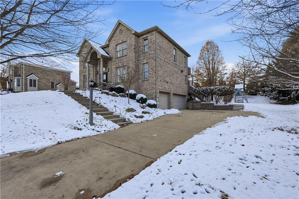 2017 Condor Lane Gibsonia, PA 15044 - Photo 41 of 49 a view of a house with a snow in the yard